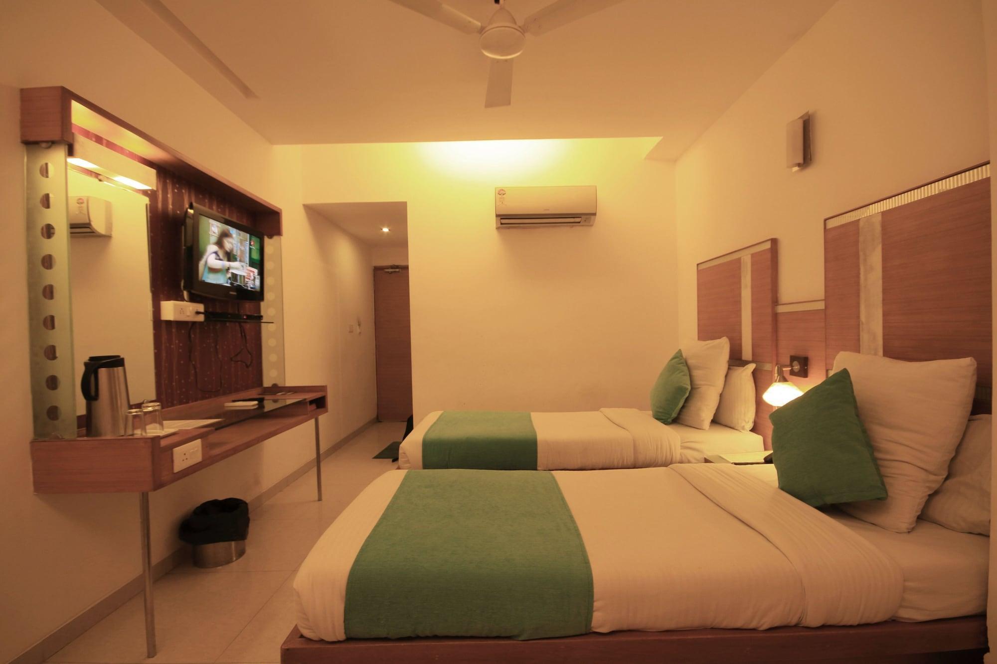 Fabhotel Kadamb Inn อาเมดาบัด ภายนอก รูปภาพ