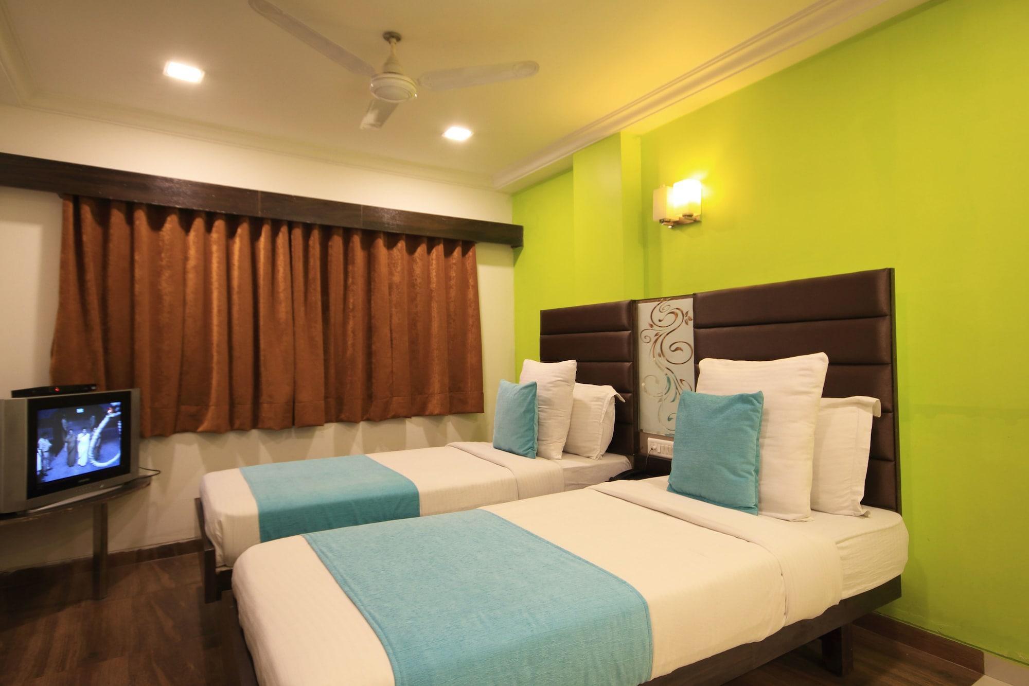 Fabhotel Kadamb Inn อาเมดาบัด ภายนอก รูปภาพ
