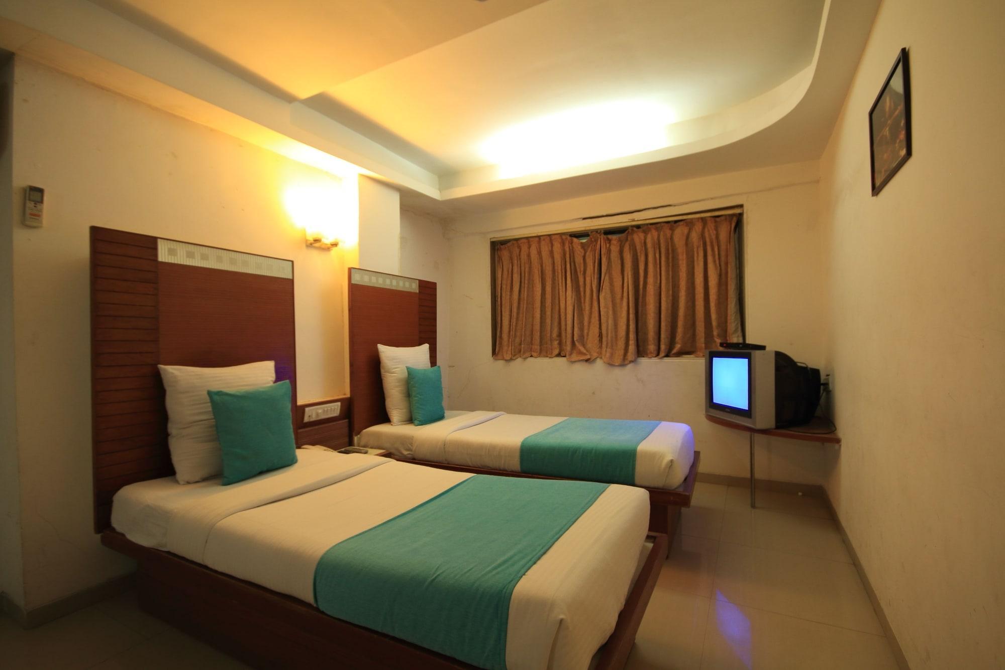 Fabhotel Kadamb Inn อาเมดาบัด ภายนอก รูปภาพ